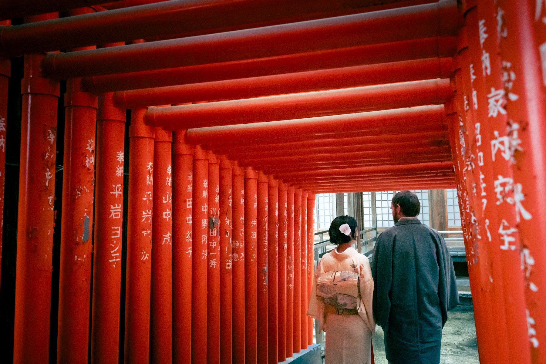 Close-up photo of a bookshelf with old books.